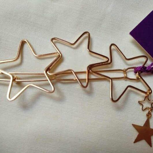 Pasador pelo color dorado mujer 3 estrellas y2 pequeñas colgando Nuevo