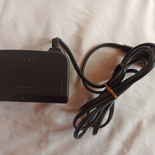 ADAPTADOR CORRIENTE NINTENDO 64 ORIGINAL NINTENDO  NUEVO SIN PRECINTO (154)